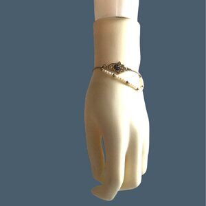WOMENS ADJUSTABLE BRACELET WITH PEARLS AND EVIL EYE/HAND CHARM